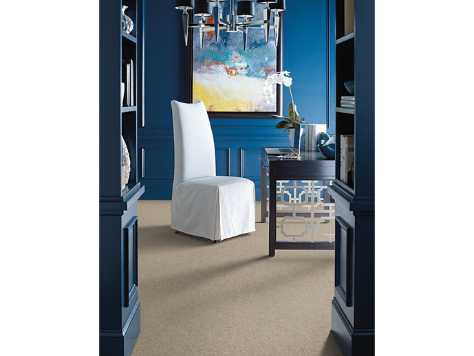 stylish room with blue walls with a chair and desk for Preston Thompson's Carpet Shoppe in Dickson